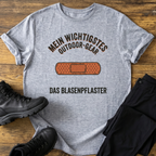 Das Blasenpflaster T-Shirt